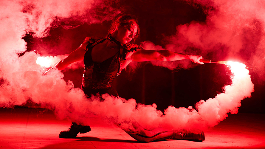Performer Felicity Boyd of Motus Collective. Fire performance at UNSEEN Winter Solstice Fire Festival 2023, event by Dragon Mill, Light Square, Adelaide, photo by Bill J Pearce