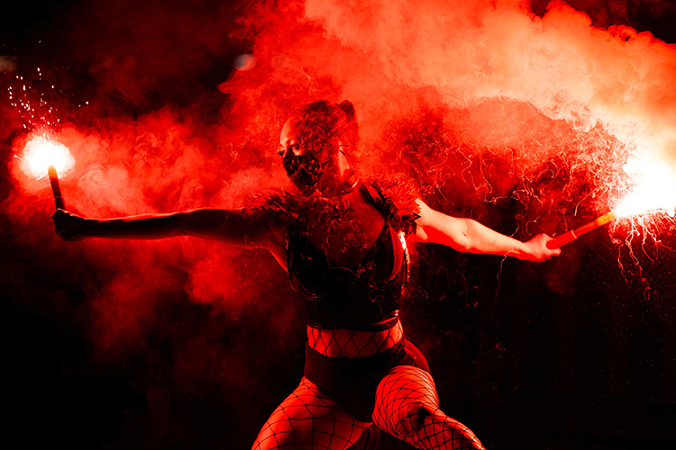 Performer Felicity Boyd of Motus Collective. Fire performance at UNSEEN Winter Solstice Fire Festival 2023, event by Dragon Mill, Light Square, Adelaide, photo by Bill J Pearce