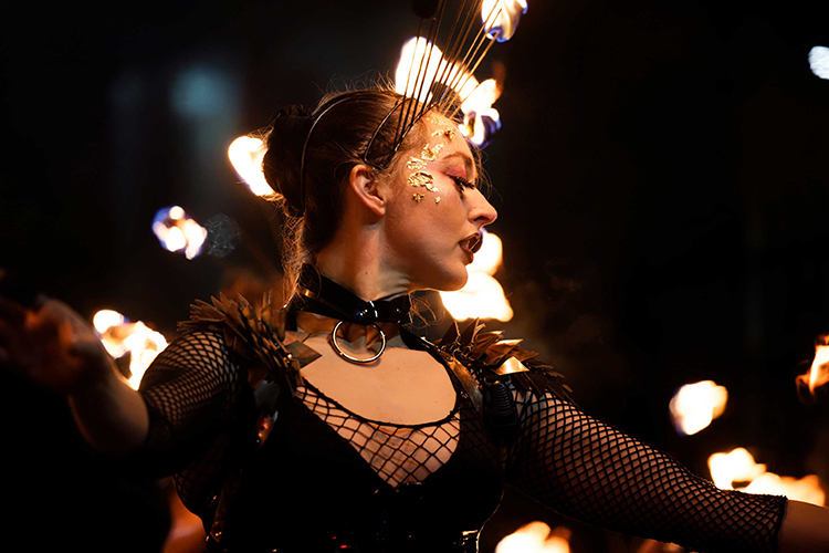 Performer Felicity Boyd of Motus Collective. Fire performance at UNSEEN Winter Solstice Fire Festival 2023, event by Dragon Mill, Light Square, Adelaide, photo by Bill J Pearce