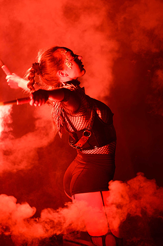 Performer Felicity Boyd of Motus Collective. Fire performance at UNSEEN Winter Solstice Fire Festival 2023, event by Dragon Mill, Light Square, Adelaide, photo by Bill J Pearce