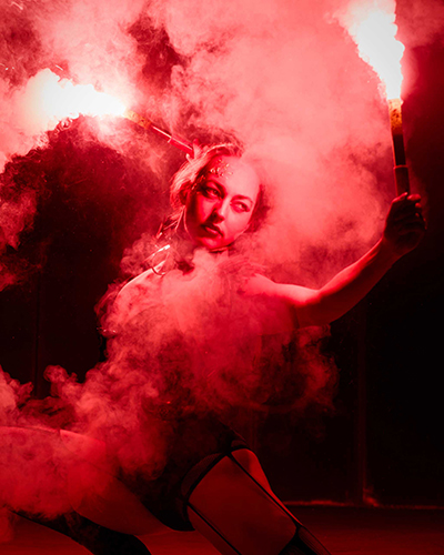 Performer Felicity Boyd of Motus Collective. Fire performance at UNSEEN Winter Solstice Fire Festival 2023, event by Dragon Mill, Light Square, Adelaide, photo by Bill J Pearce